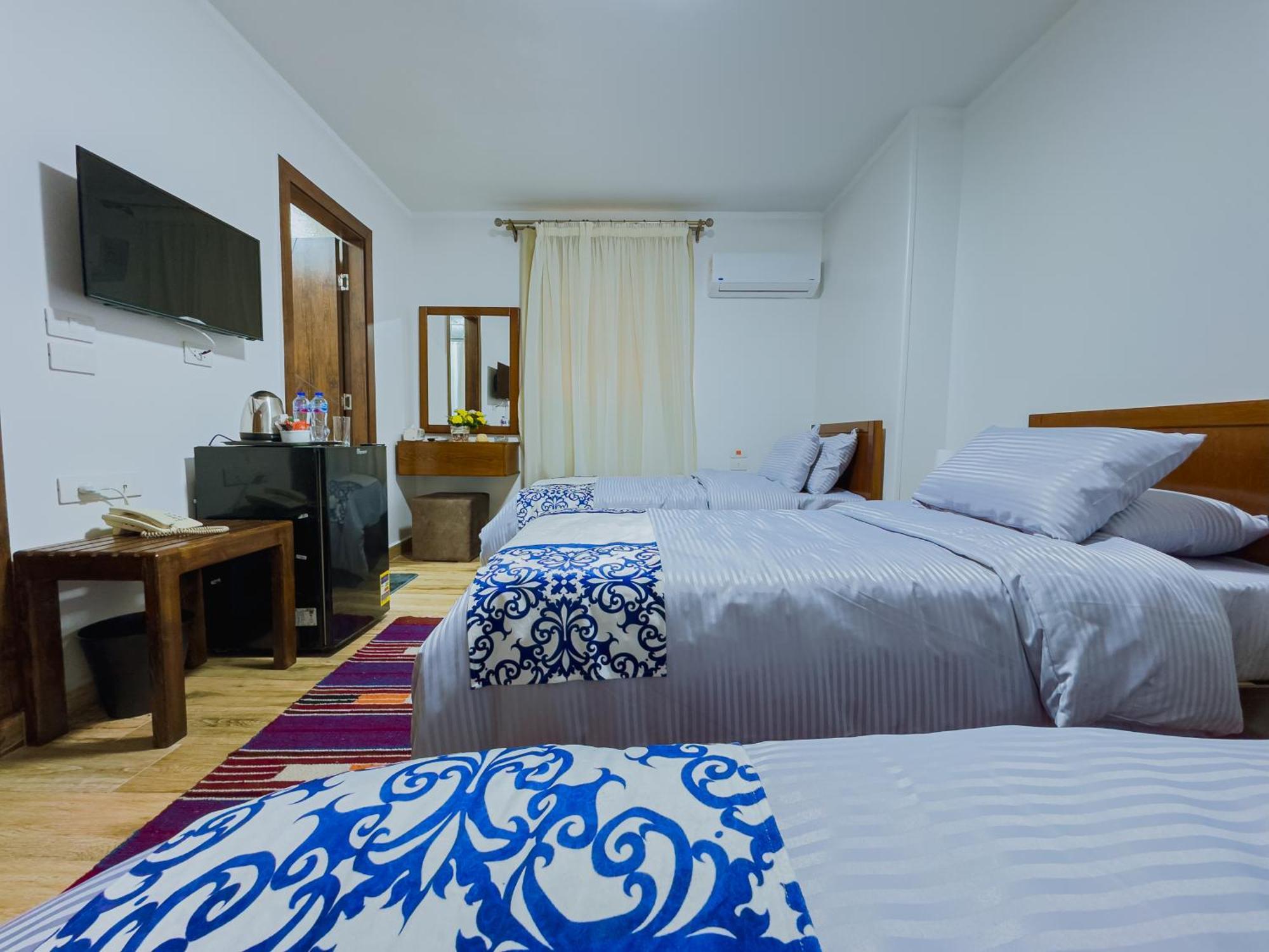 Royal Crown Hotel Giza Pyramids View Kafret el-Gabal Rom bilde